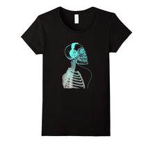Skeleton Listening to Music With Headphones on His Skull