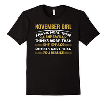 NOVEMBER GIRL Knows More Than She Says, Speaks, You Realize